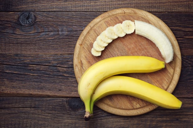 Ripe bananas and a sliced