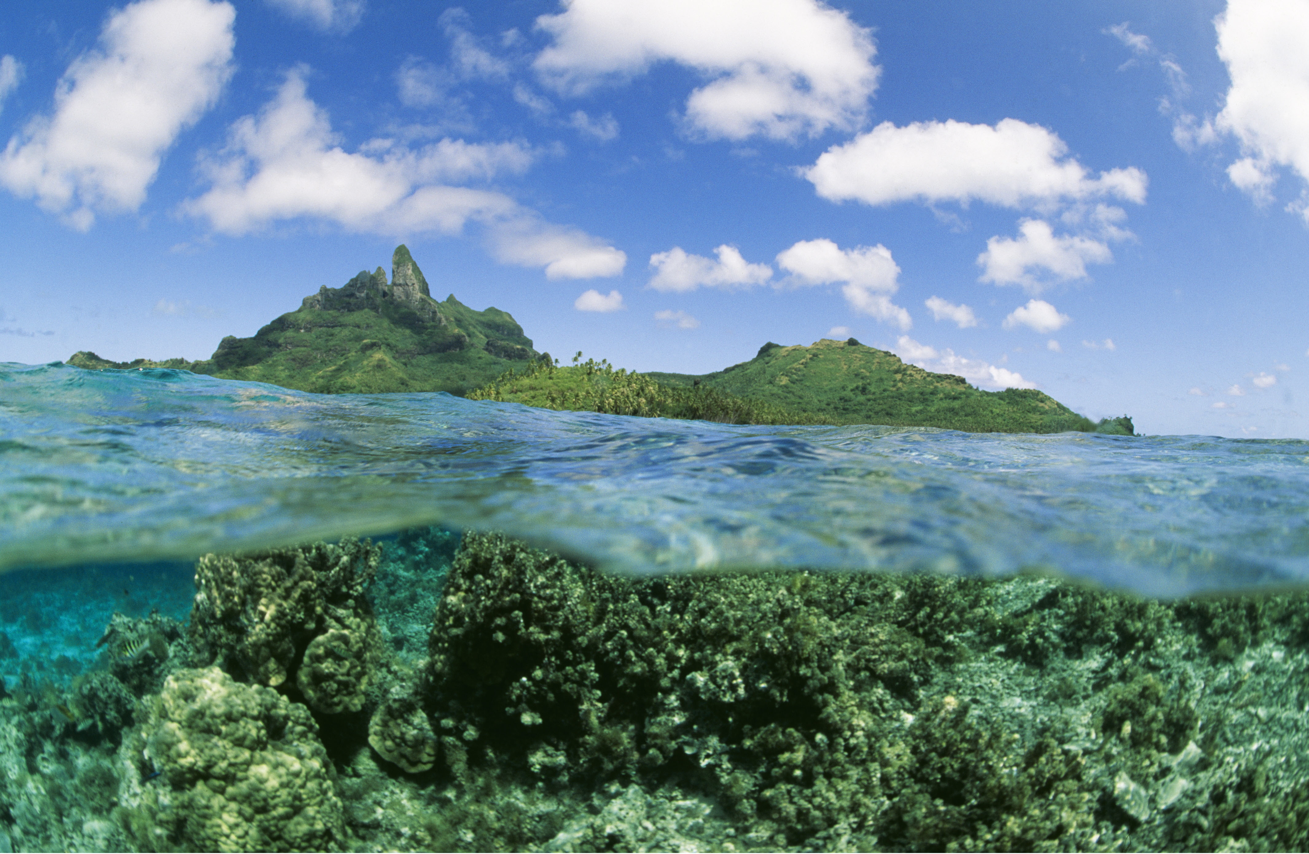 PACIFIC – Coral reef and volcanoes