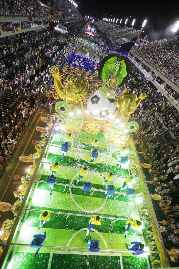 Revellers from the Uniao da Ilha samba school participate in the annual Carnival parade in Rio de Janeiro's Sambadrome