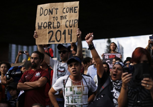 Demonstrators shouts slogans during a protest against the 2014 World Cup in Sao Paulo